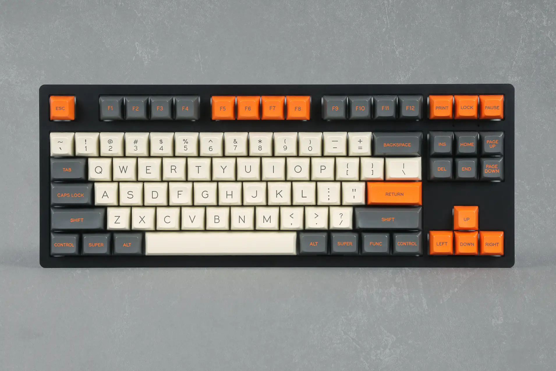 view from above of a standard computer keyboard using the orange-grey-and-beige Carbon keycaps