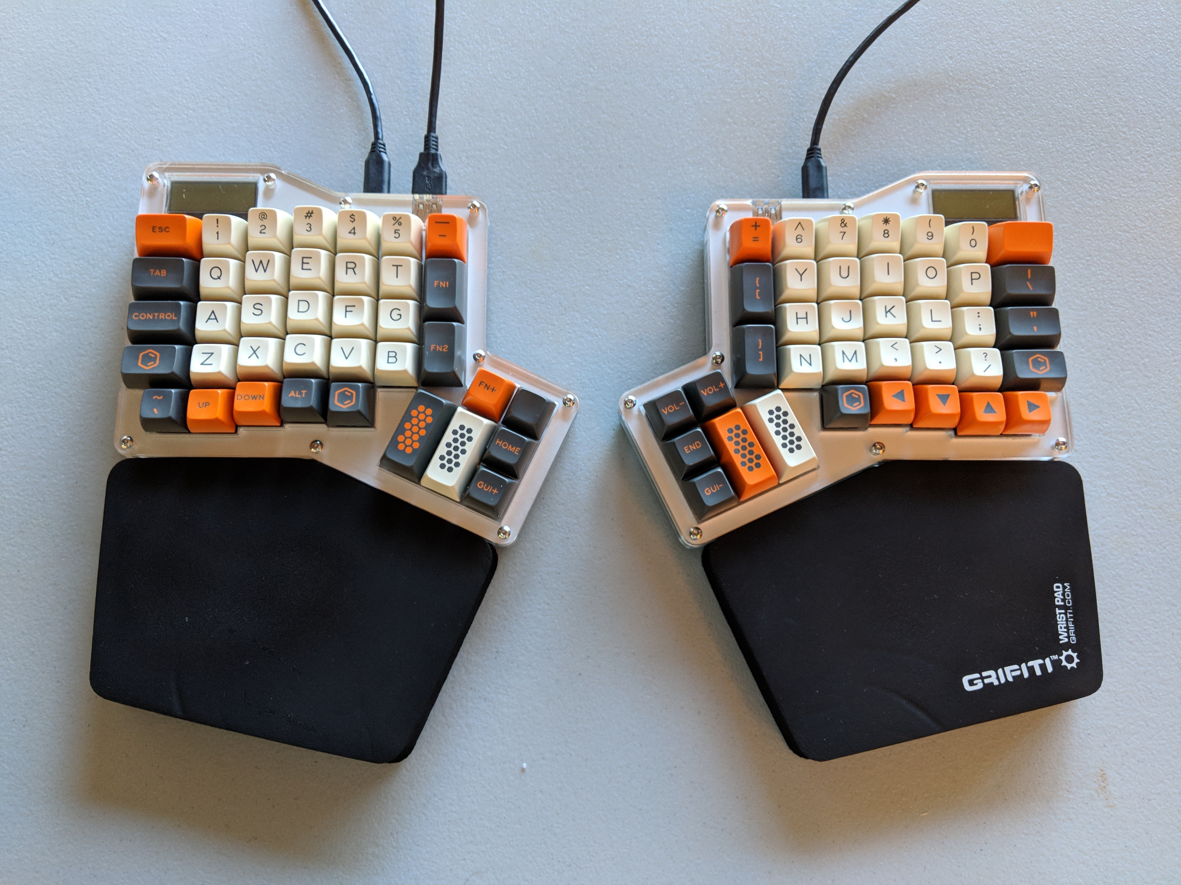 my Infinity Ergodox build, outfitted with SA Carbon keycaps