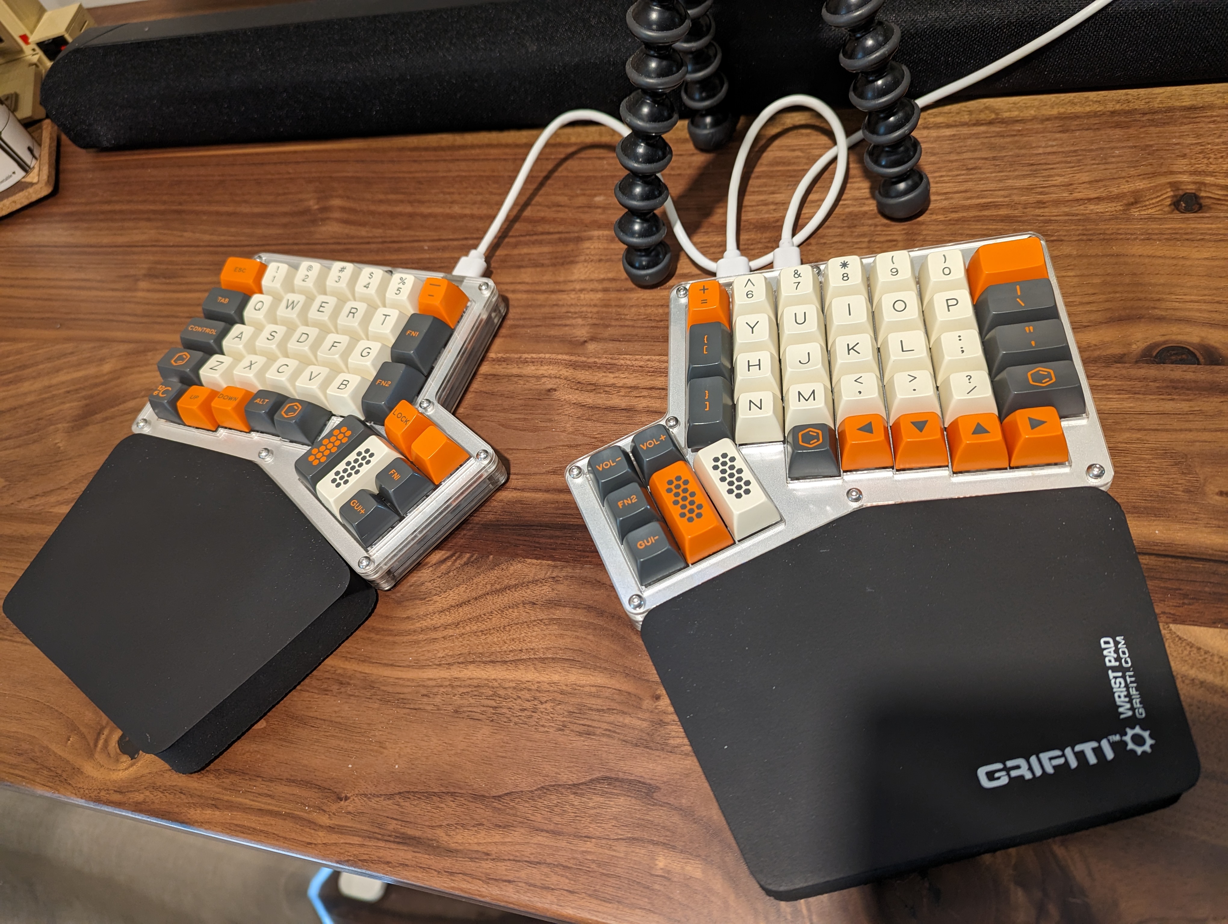 Hot Dox split keyboard with orange/grey/beige keycaps