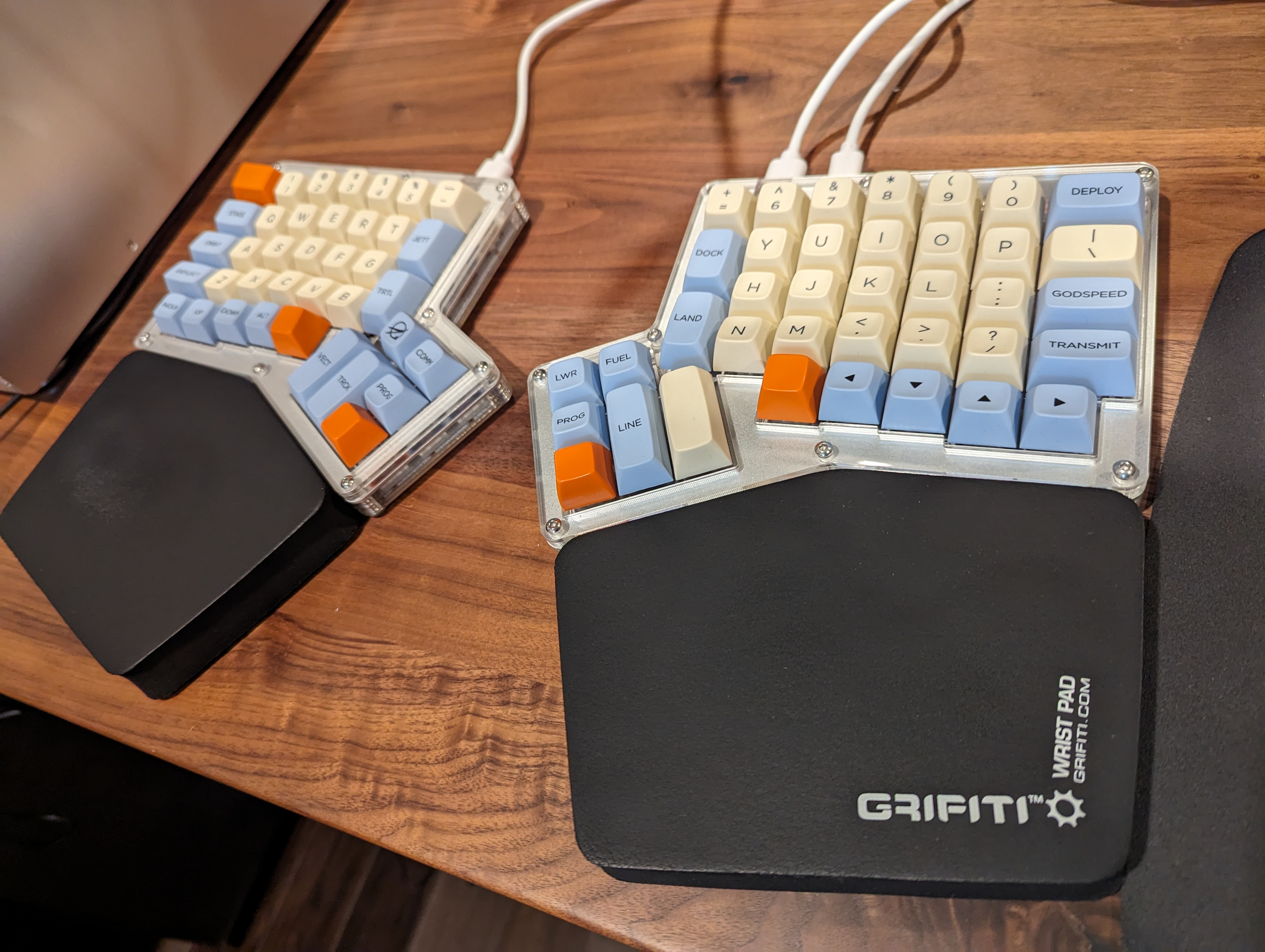 Hot Dox split keyboard with orange/lightblue/beige keycaps